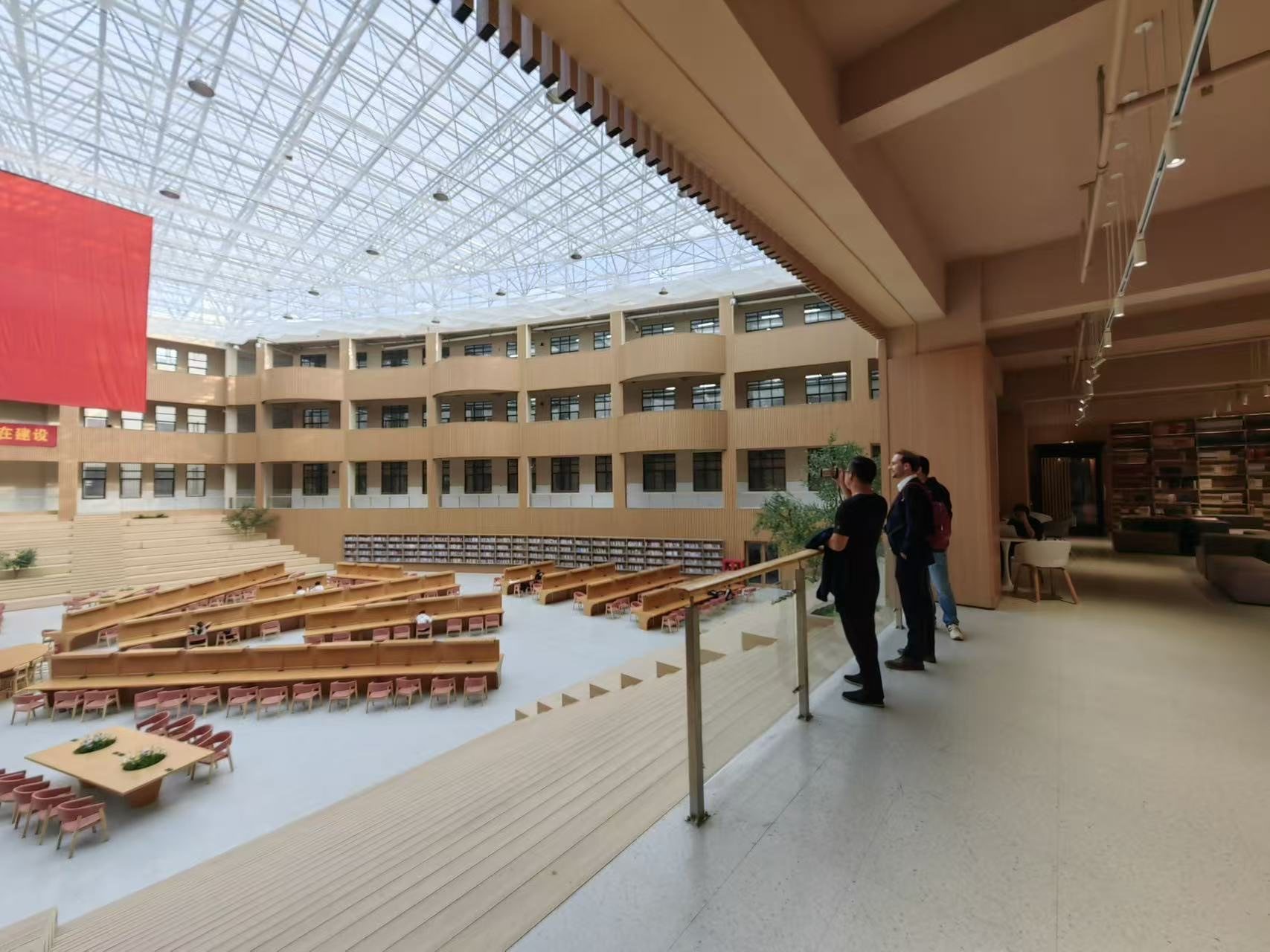 Visitors touring a partner university library